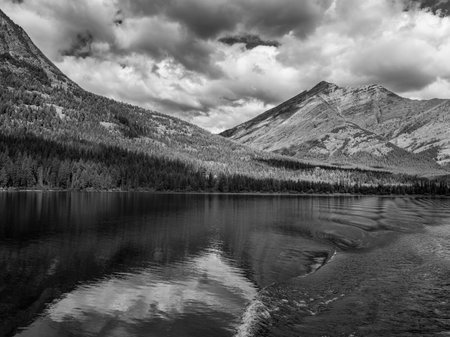 Lake with mountain range in the background, Waterton Lake, Waterton-Glacier International Peace Park, Waterton Lakes National Park, Alberta, Canadaのeditorial素材