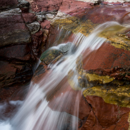 Water falling from rock, Red Rock Canyon Parkway, Waterton Lakes National Park, Alberta, Canadaのeditorial素材