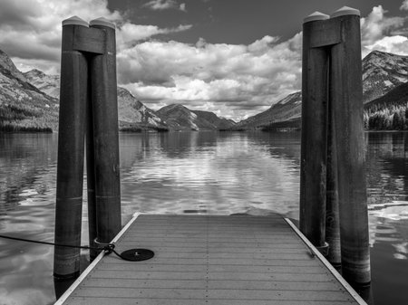 Lake with mountain range in the background, Waterton Lake, Waterton-Glacier International Peace Park, Waterton Lakes National Park, Alberta, Canadaのeditorial素材