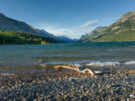 Lake with mountain range in the background, Waterton Lake, Waterton-Glacier International Peace Park, Waterton Lakes National Park, Alberta, Canadaのeditorial素材