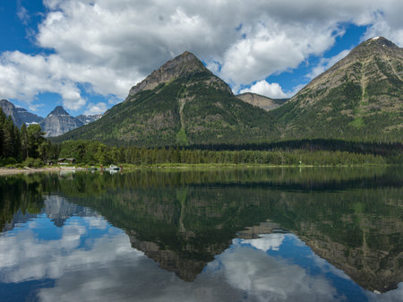 Lake with mountain range in the background, Waterton Lake, Waterton-Glacier International Peace Park, Waterton Lakes National Park, Alberta, Canadaのeditorial素材