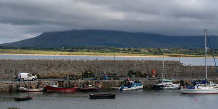 Boats moored at a dock, Mullaghmore Peninsula, Grange, County Sligo, Ireland