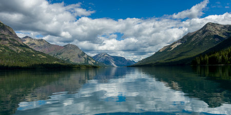 Lake with mountain range in the background, Waterton Lake, Waterton-Glacier International Peace Park, Waterton Lakes National Park, Alberta, Canadaのeditorial素材