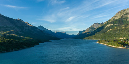 Lake with mountain range in the background, Waterton Lake, Waterton-Glacier International Peace Park, Waterton Lakes National Park, Alberta, Canadaのeditorial素材