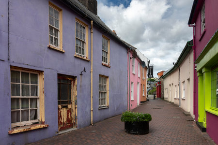 Residential buildings and stores amidst narrow lane of old town, Kinsale, County Cork, Irelandのeditorial素材