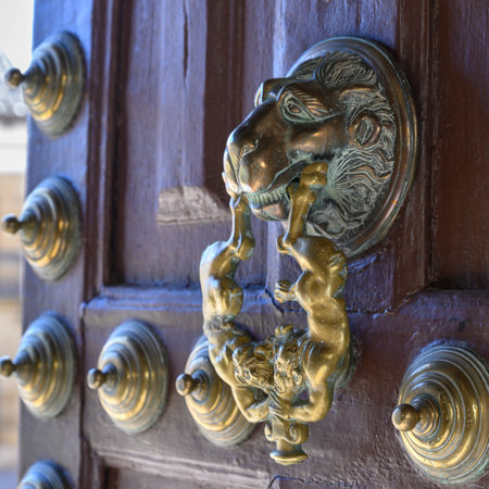 Close-up of brass door knocker, ï¿½beda, Jaen Province, Spainのeditorial素材