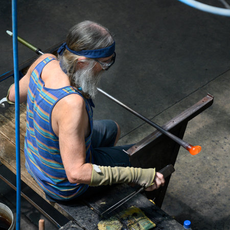 Man working with molten glass, Whangarei, Northland, North Island, New Zealandのeditorial素材