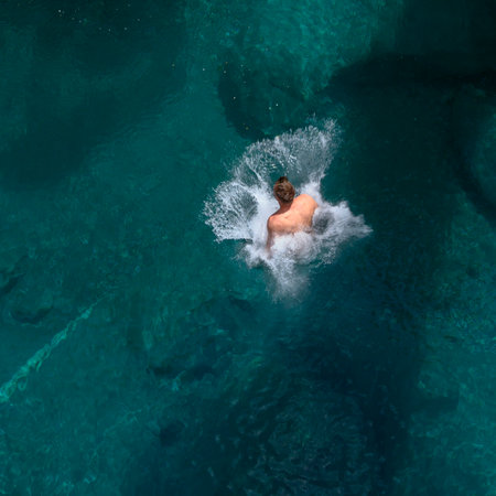 Man diving into Makarora River's Blue Pools, Mt Aspiring National Park, Wanaka, Otago Region, South Island, New Zealandのeditorial素材