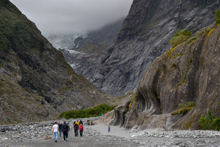 Tourists at Franz Josef Glacier walk, Westland National Park, South Island, New Zealandのeditorial素材