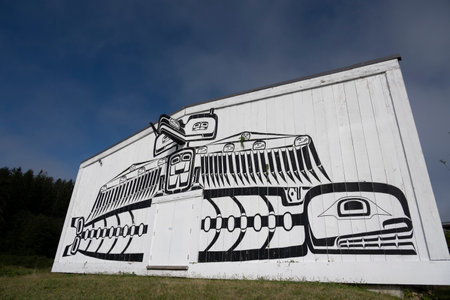 Indigenous Artwork on the exterior of U'mista Cultural Centre in Alert Bay on Cormorant Island, Johnstone Strait, British Columbia, Vancouver Island, Canadaのeditorial素材