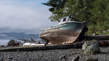Boat stranded ashore on Alert Bay, Cormorant Island, Johnstone Strait, Vancouver Island, British Columbia, Canadaのeditorial素材