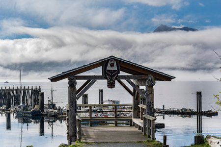 Covered dock along the shoreline of Alert Bay on Cormorant Island, Johnstone Strait, British Columbia, Vancouver Island, Canadaのeditorial素材