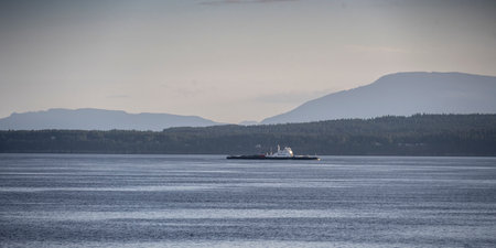 View of a passing ship on a BC Ferry from Nanaimo (Departure Bay) to Vancouver (Horseshoe Bay), Strait of Georgia, Bechin Hill, Vancouver Island, British Columbia, Canadaのeditorial素材