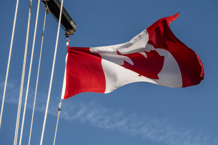 Canadian Flag on a BC Ferry from Nanaimo (Departure Bay) to Vancouver (Horseshoe Bay), Strait of Georgia, Bechin Hill, Vancouver Island, British Columbia, Canadaのeditorial素材
