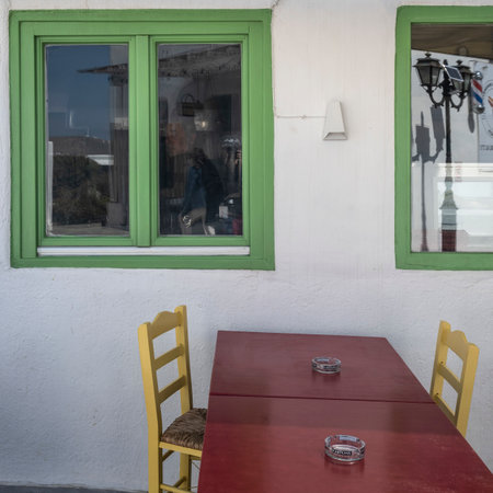 Table setting of an outdoor cafe, Ano Mera Mykonos Island Greeceのeditorial素材