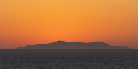 Sunset over the Aegean Sea, Cyclades Islands, Mykonos Greeceのeditorial素材