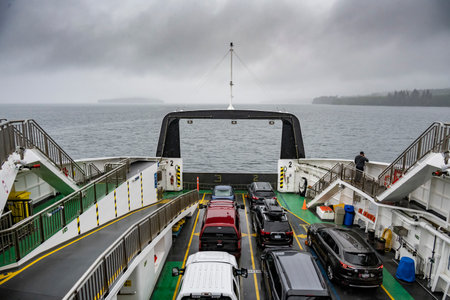 Ferry traveling through Alert Bay, Cormorant Island, Johnstone Strait, Vancouver Island, British Columbia, Canadaのeditorial素材
