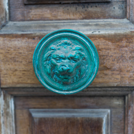 Animal figurine ornament on a door knob in Mykonos Town, Mykonos Island, Greeceのeditorial素材