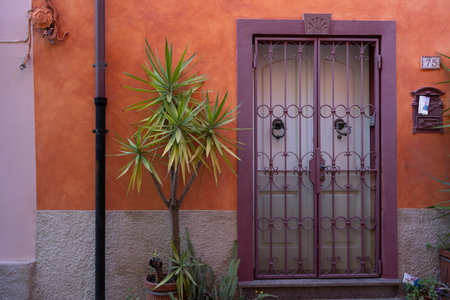 Exterior of a building in the town of Bosa is situated about two-thirds of the way up the west coast of Sardinia, Italyのeditorial素材
