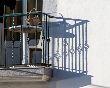 Balcony on a building in Vila Nova de Milfontes that is a town and civil parish in the municipality of Odemira, in the Alentejo region in Portugalのeditorial素材