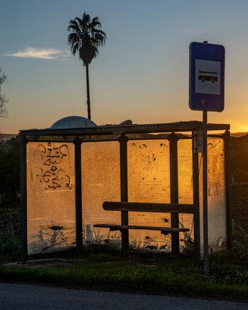 Bench in a bus stop shelter at Parque Natural da ArrÃ¡bida that covers the southernmost margin of the SetÃºbal Peninsula, Portugalのeditorial素材