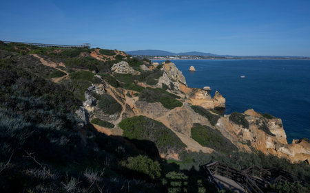View of the Atlantic Ocean along the coastline, Praia da Boneca, The Ponta da Piedadeca, Lagos, Faro, Portugalのeditorial素材