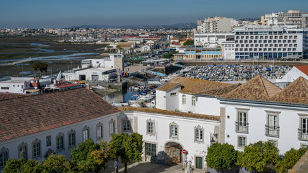Rooftop view of buildings in Faro, which is the capital of southern Portugalâs Algarve region. The cityâs neoclassical Arco da Vila is on the site of a gate that was part of the original Moorish wallのeditorial素材
