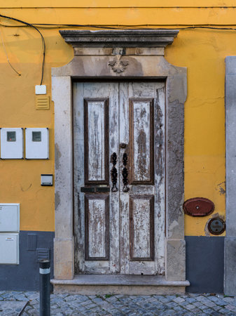 Entrance door to a building in the town of Lagos in southern Portugal's Algarve region, known for its walled old town, cliffs and Atlantic beachesのeditorial素材