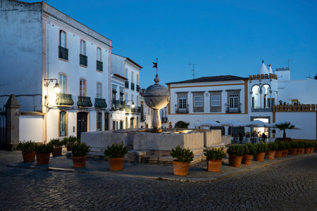 Fountain in a plaza in Ã‰vora which is the capital of Portugal's south-central Alentejo region....