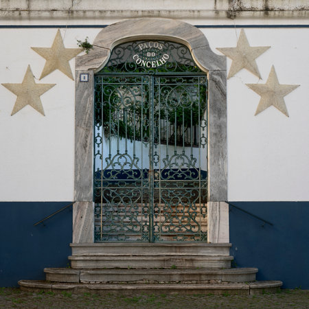 Gated entranceway to a building in Evora, Portel, UNESCO's world heritage, a town included in...