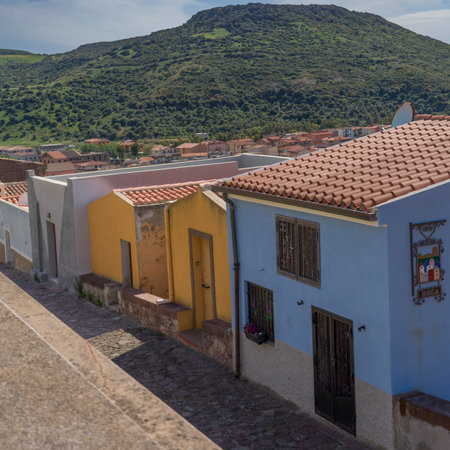 Buildings along a roadway in the Town of Bosa, Oristano, Sardinia, Italyのeditorial素材