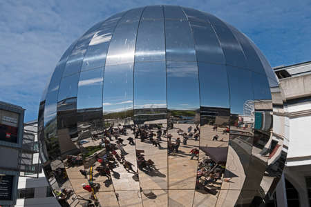 Bristol, UK - April 22, 2017: The distorted reflections of participants in the March for Science are...
