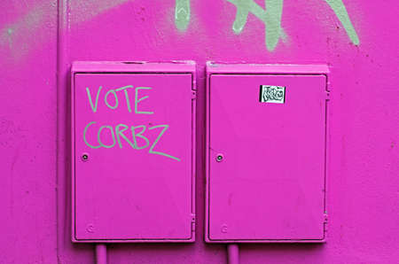 Bristol, UK - June 7, 2017: Graffiti referring to Labour Party leader Jeremy Corbyn encourages...
