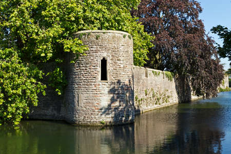 Wells, UK - July 14, 2011: The moat and wall of the Bishopâs Palaceのeditorial素材