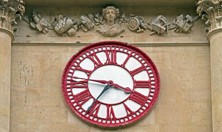 Bristol, UK - September 4, 2012: The clock on the Corn Exchange, which has two minute hands showing the time in both Bristol and Londonのeditorial素材