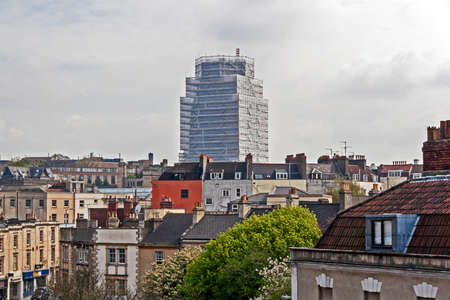 Bristol, UK -April 28, 2006: The tower of the Wills Memorial Building at the University of Bristol is hidden behind scaffolding and plastic sheeting as restoration work takes placeのeditorial素材