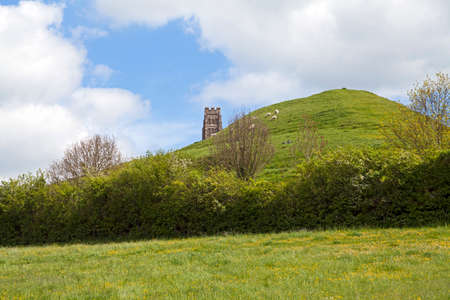 Glastonbury, UK - May 13, 2012: A view across the fields to Glastonbury Torのeditorial素材