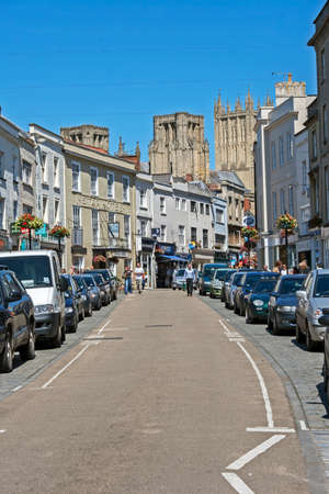 Wells, UK - July 18, 2007: The High Street on a sunny summer day with the cathedral visible in the background.のeditorial素材