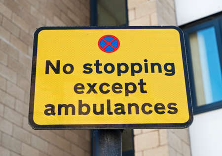 Weston-super-Mare, UK - September 18, 2019: A sign reading âNo stopping except ambulancesâのeditorial素材