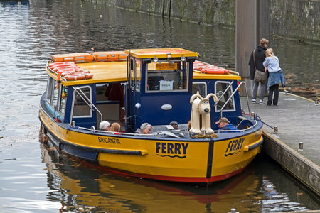 Bristol, UK - November 12, 2016: A ferry boat on the Floating Harbour with the cartoon dog Gromit as a figureheadのeditorial素材