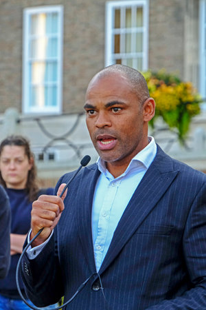 Bristol, UK - August 15, 2017: Marvin Rees, mayor of Bristol, speaks at a vigil on College Green to mark the death of Heather Heyer, who was killed at an anti-fascist demonstrationのeditorial素材