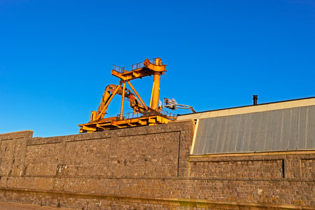 Weston-super-Mare, UK - January 16, 2023: The late afternoon sun shines on workers demolishing art installation See Monsterのeditorial素材