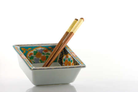 square japanese food bowl and two chopsticksの写真素材