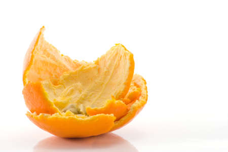 used orange peel and pips after eating orangeの写真素材