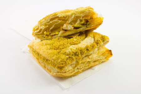 Single sliced pasty on a napkin with a while backgroundの写真素材