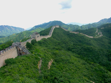 View of Great Wall of China with green surrounding natureの写真素材