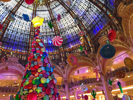 Paris France, 16 November 2017: Giant Christmas tree decoration inside Galeries Lafayette Parisian department storeのeditorial素材