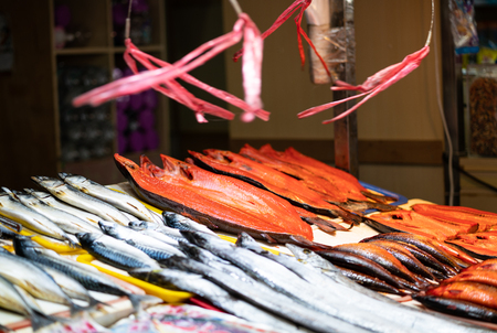 Fresh fish stall in covered market on Cijin island Kaohsiung Taiwan