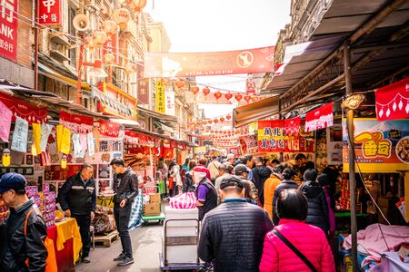 Taipei Taiwan, 15 February 2018 : Old Dihua jie shopping street full of people with dramatic ligh in Taipei Taiwanのeditorial素材