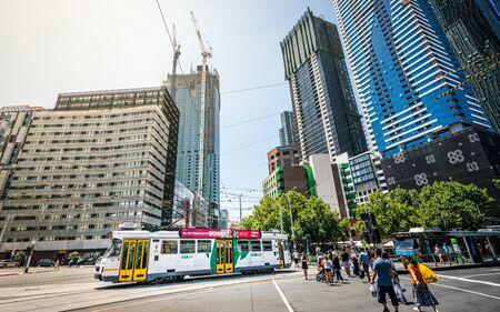 4 January 2019, Melbourne Vic Australia : Wide angle street view of Melbourne tram and buildings in...